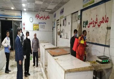 بازار ماهی‌ و  تره‌بار گناوه ضدعفونی شد
