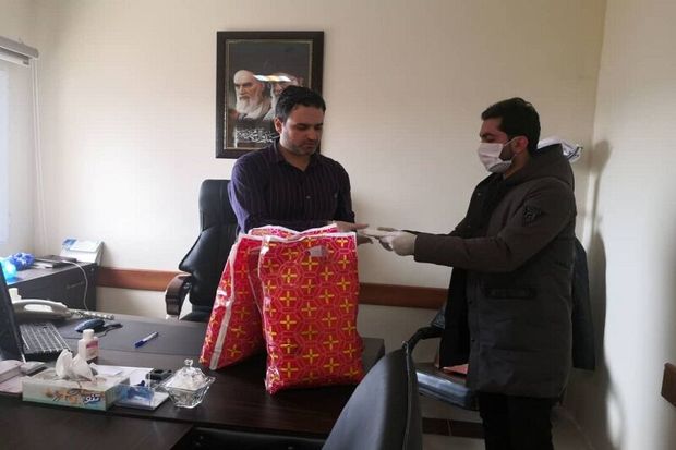 سازمان مردم نهاد در بیمارستان آستارا ماسک توزیع کرد