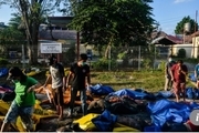 دفن قربانیان زلزله در گور 100 متری+ تصاویر