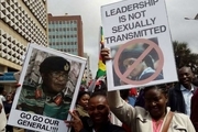 تظاهرات ضدموگابه+ تصاویر