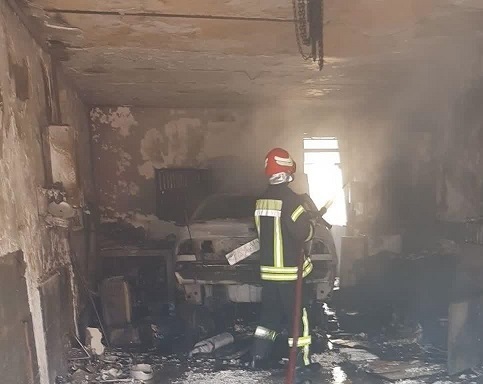نجات پسر نوجوان در حادثه آتش سوزی تعمیرگاه خودرو در تبریز