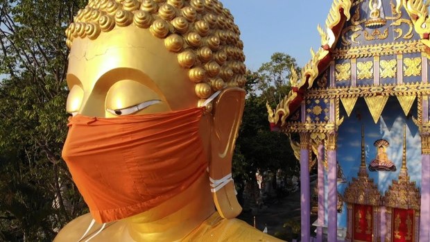 مجسمه بودا در بانکوک هم ماسک‌پوش شد