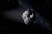 عبور سیارکی به بزرگی یک هواپیما از کنار کره زمین