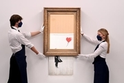 فروش 18.5 میلیون پوندی ‏تابلو نقاشی «دخترک و بادکنک بنکسی»‌
