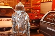 اهدای لباس ضدحریق توسط خیر سردشتی به آتش‌نشانی