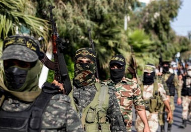 رژه نیروهای جهاد اسلامی در خیابان‌های غزه به احترام رمضان عبدالله