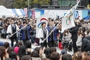 پرچم المپیک و پارالمپیک بعد از 3 سال سفر به توکیو رسید + عکس

