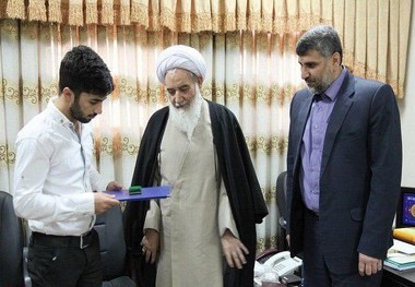 اهدای هدیه رهبر انقلاب به قهرمان کرمانشاهی پاورلیفتینگ
