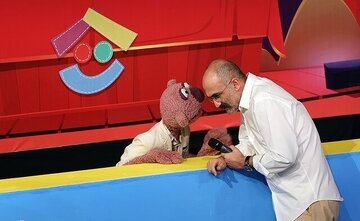 علاقه بازیگر «پوست شیر» به عروسک

