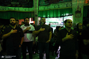 آیین سنتی نخل گردانی و عزاداری ظهر عاشورا در تکیه بزرگ تجریش