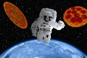 پیتزا خوردن فضانوردان در ایستگاه فضای بین المللی+ ویدیو
