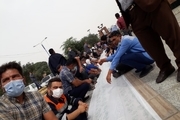 اعتراض متفاوت کارگران آبفای اهواز + تصاویر