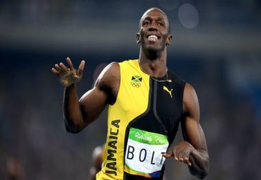 یوسین بولت و حمایت از طلایی پوشان در جام جهانی + عکس