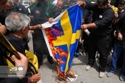 پرچم سوئد در تهران به آتش کشیده شد 