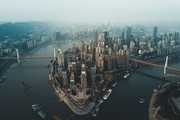 عکس روز نشنال جئوگرافیک، شهری از ابر و مه