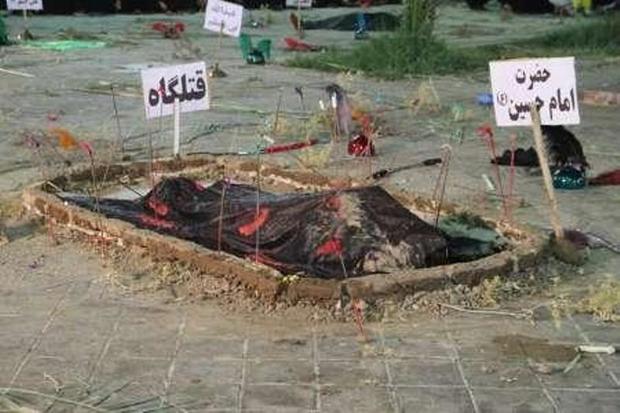 آیین نمادین کفن و دفن شهدای کربلا در شوش برگزار شد