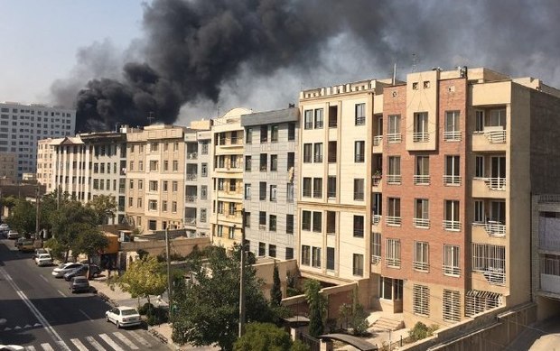 آتش سوزی ساختمان در حال ساخت در باغ فیض تهران