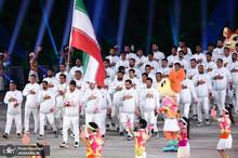 عکس و ویدیو| رژه کاروان ایران در بازی های ساحلی آسیا به یاد شهدای ناو دنا