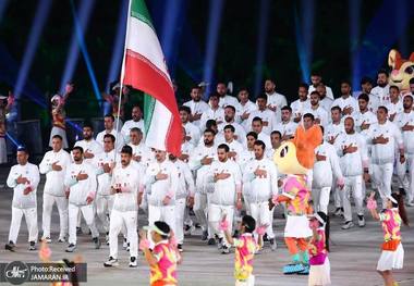 عکس و ویدیو| رژه کاروان ایران در بازی های ساحلی آسیا به یاد شهدای ناو دنا